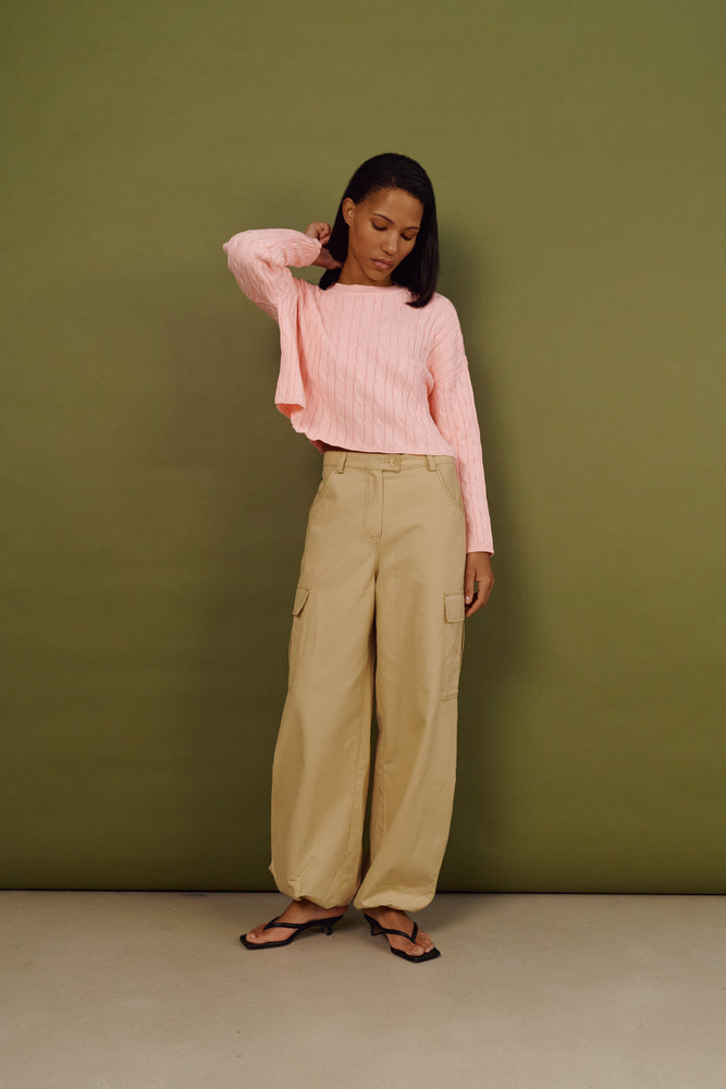 Укорочений светр косичка