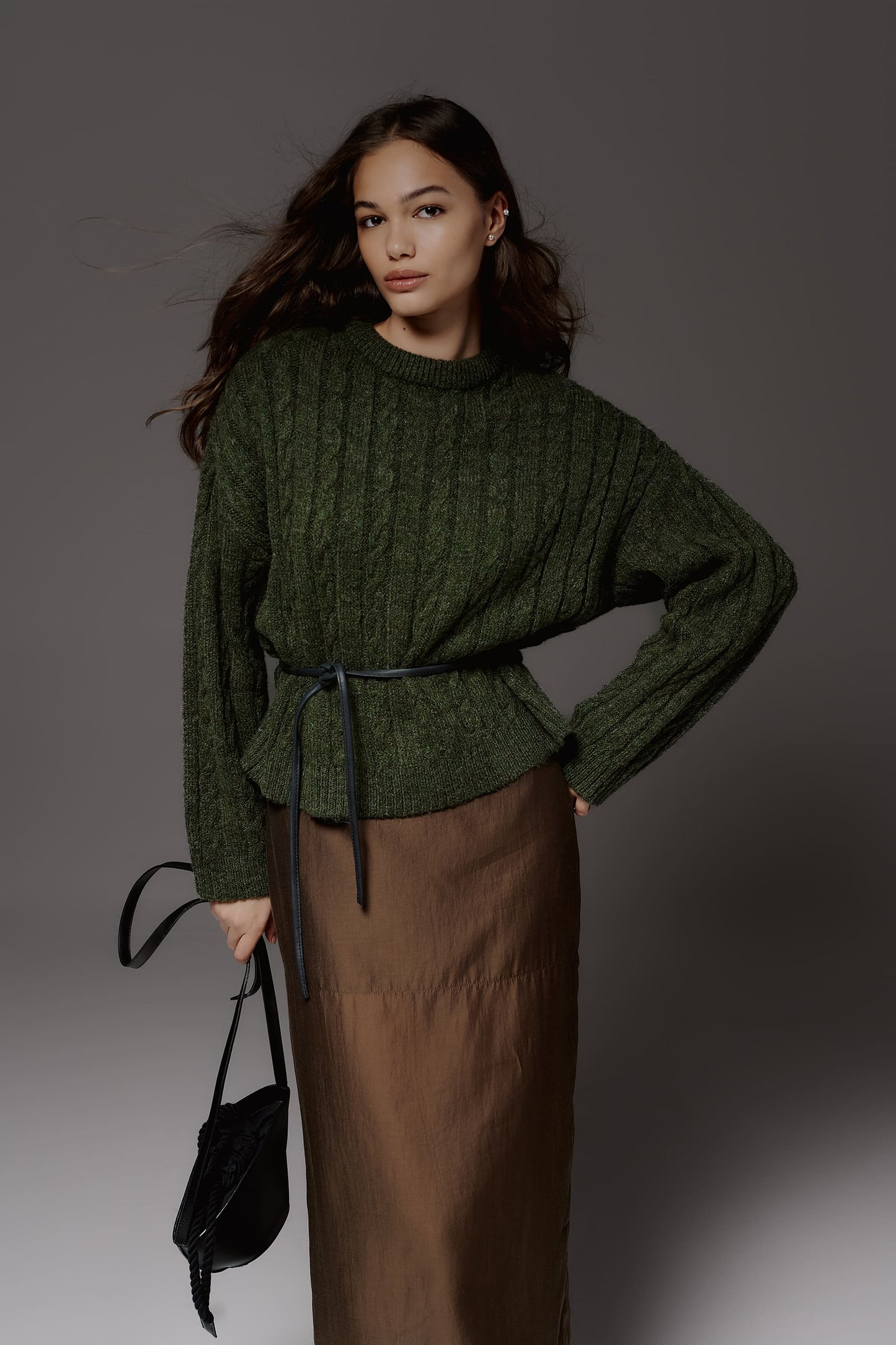 Wool sweater with pigtails